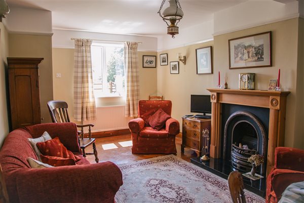 Lounge with settee and armchairs